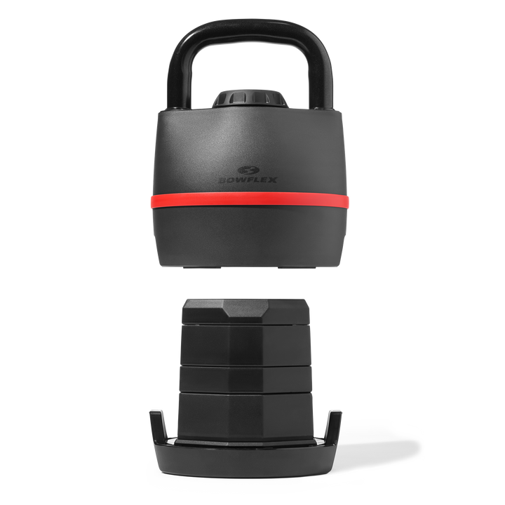 BowFlex SelectTech 840 Kettlebell lifted to show its adjustable weight plates.