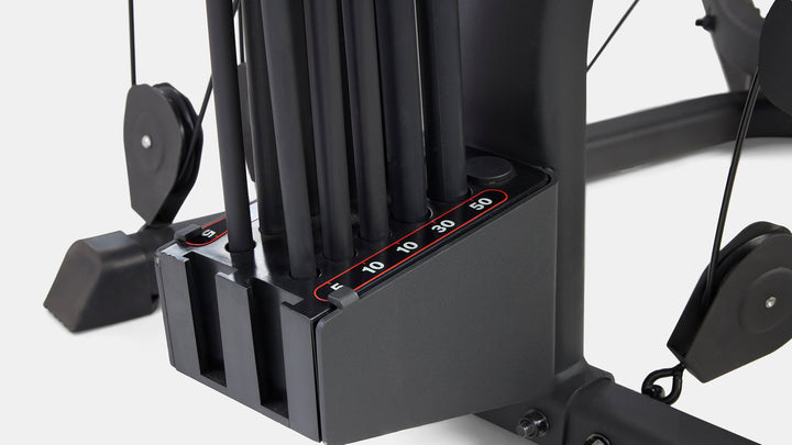 Close-up of the base of the BowFlex Xtreme 2 SE Home gym 210 lbs of Power Rod® resistance.
