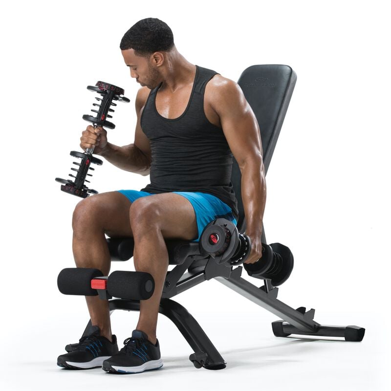 Man using dumbbells on 3.1S Bench. - expanded view