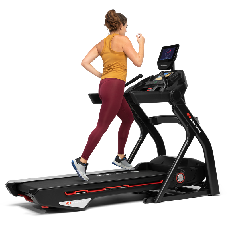 A woman jogging on a Treadmill 25. - expanded view