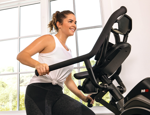 man using max trainer